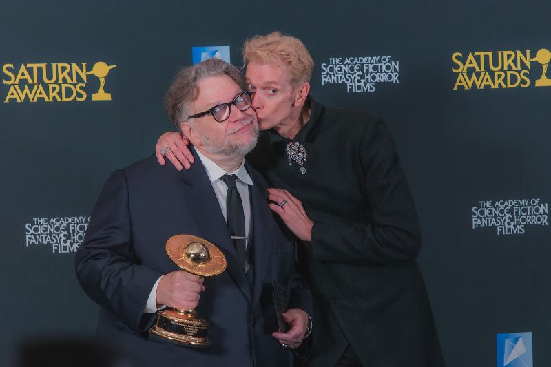 Guillermo del Toro and actor Doug Jones posing together at the 53rd Saturn Awards.